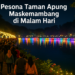 alt_text: "Pesona malam Lumiland Maskemambang dengan lampu warna-warni di taman wisata Purwokerto."